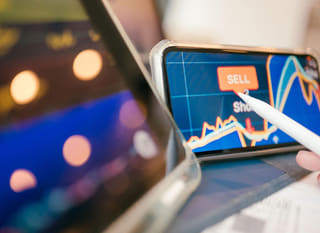 Analyst studying forex options alongside Bitcoin and Ethereum across multiple markets